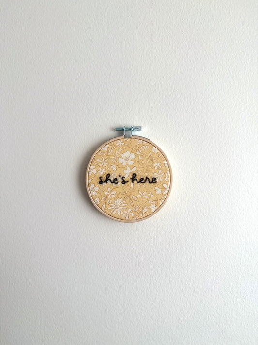 Yellow Floral "She's Here" Embroidered Announcement